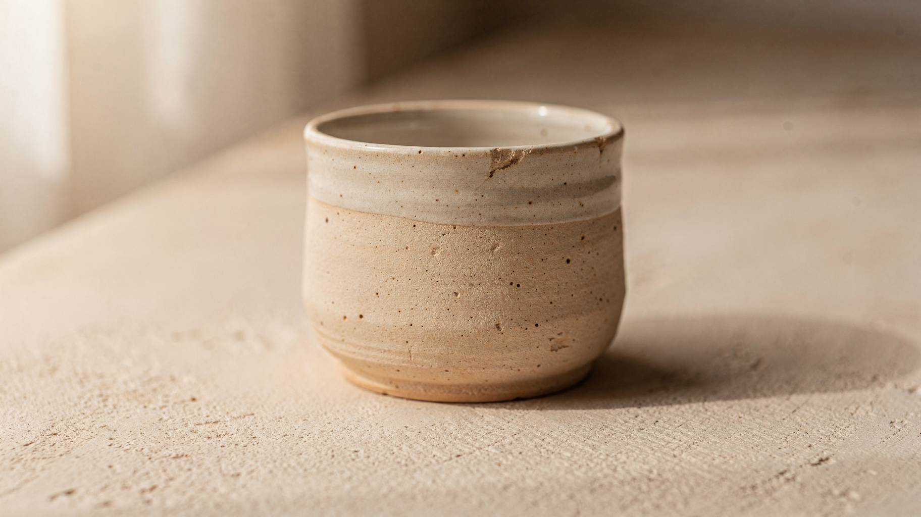 A handmade product on a warm, minimal surface